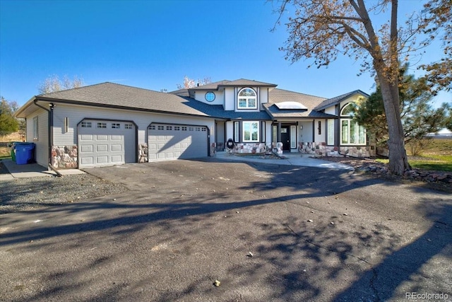 view of front of home with a garage