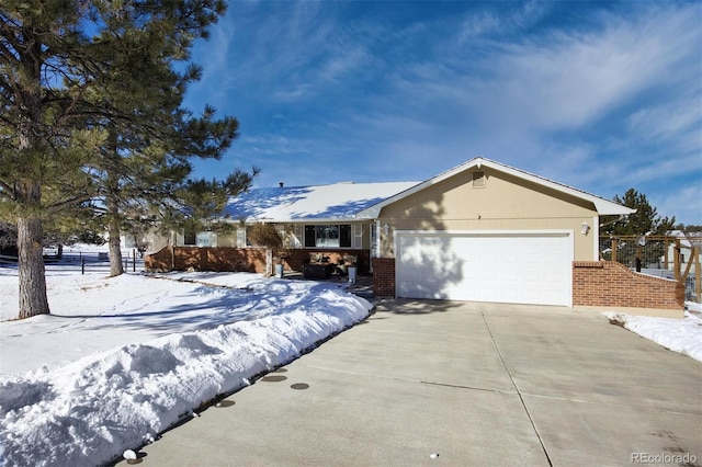 ranch-style home with a garage