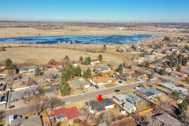 drone / aerial view with a water view