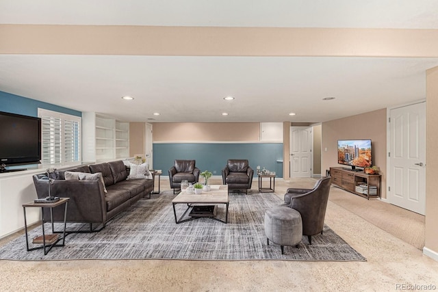 living room with carpet and built in features