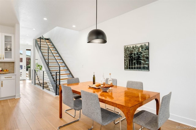 4227 Mariposa St, Denver, CO 80211 - dining room with light wood-style flooring, recessed lighting, stairs, and baseboards