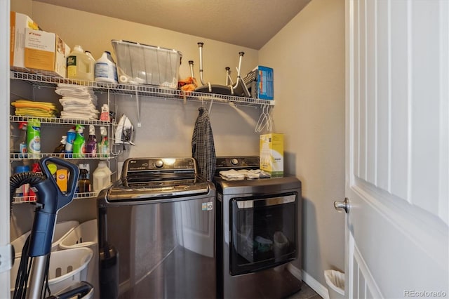 2431 Nicholson St, Berthoud, CO 80513 - laundry room featuring washer and clothes dryer and baseboards