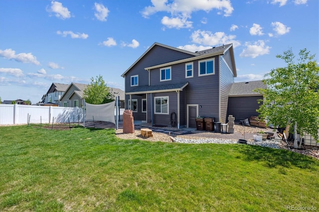 2431 Nicholson St, Berthoud, CO 80513 - back of house featuring a shingled roof and a patio area