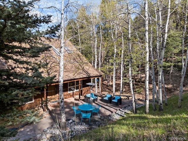 11724 Little Turtle Ln, Conifer, CO 80433 - view of yard with a patio