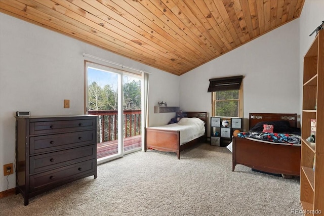 11724 Little Turtle Ln, Conifer, CO 80433 - bedroom featuring vaulted ceiling, carpet flooring, access to exterior, and wood ceiling