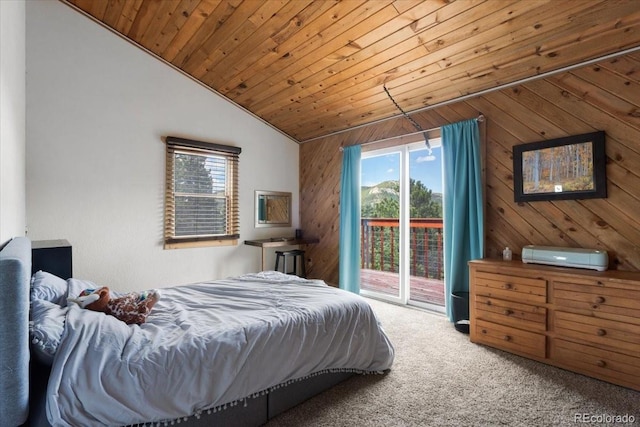 11724 Little Turtle Ln, Conifer, CO 80433 - carpeted bedroom featuring vaulted ceiling, wood ceiling, access to exterior, wood walls, and multiple windows
