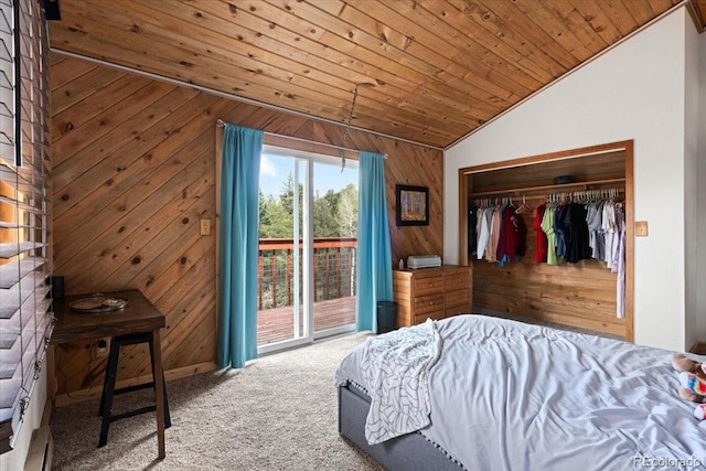 11724 Little Turtle Ln, Conifer, CO 80433 - bedroom with lofted ceiling, wood walls, wooden ceiling, access to exterior, and carpet floors