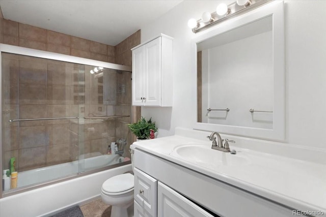 11724 Little Turtle Ln, Conifer, CO 80433 - full bathroom with toilet, vanity, combined bath / shower with glass door, and tile patterned flooring