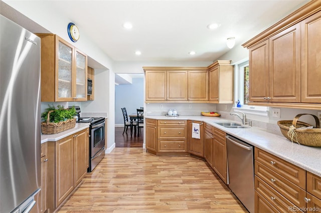 7970 S Cook Way, Centennial, CO 80122 - kitchen featuring stainless steel appliances, a sink, light wood-type flooring, light countertops, and recessed lighting