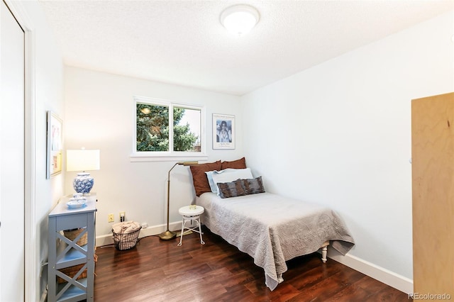 7970 S Cook Way, Centennial, CO 80122 - bedroom featuring wood finished floors and baseboards