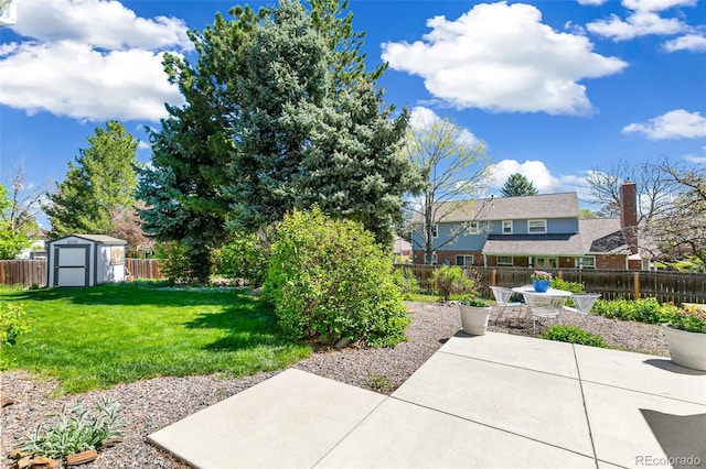 7970 S Cook Way, Centennial, CO 80122 - view of yard with a storage unit, a patio area, and an outdoor structure