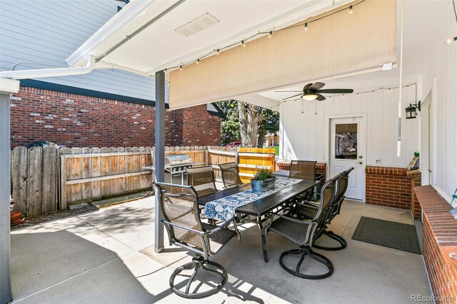 7970 S Cook Way, Centennial, CO 80122 - view of patio featuring outdoor dining space, a ceiling fan, fence, and a grill