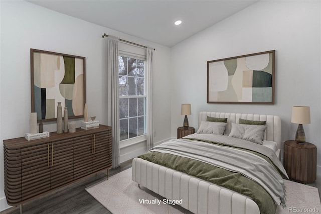 11973 E Kepner Dr, Aurora, CO 80012 - bedroom featuring wood finished floors, recessed lighting, and baseboards
