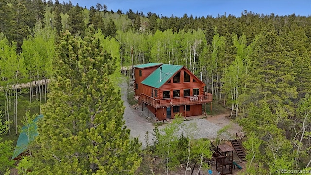 760 Coyote Cir, Black Hawk, CO 80422 - view of subject property featuring a heavily wooded area