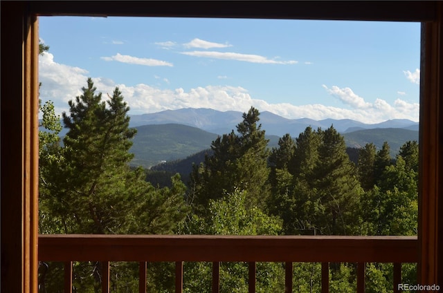 760 Coyote Cir, Black Hawk, CO 80422 - view of mountain background with a heavily wooded area