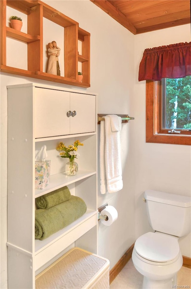 760 Coyote Cir, Black Hawk, CO 80422 - half bathroom with wooden ceiling, baseboards, and toilet