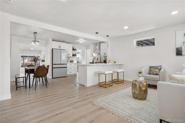 living room featuring light wood-type flooring