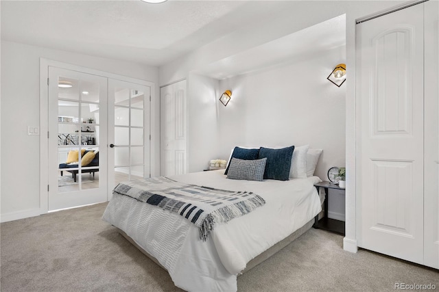 carpeted bedroom featuring french doors