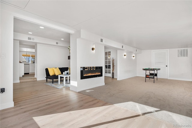 living room featuring light hardwood / wood-style flooring