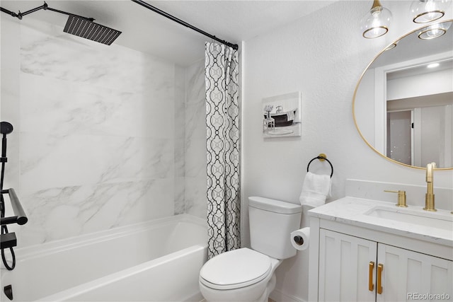 full bathroom with vanity, shower / tub combo with curtain, and toilet