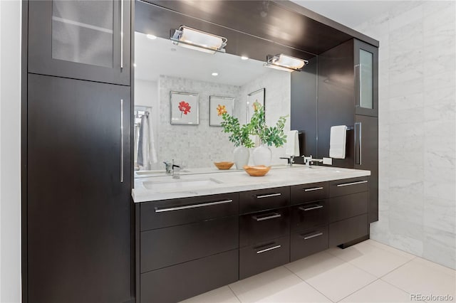 bathroom with vanity, tile walls, and tile patterned floors