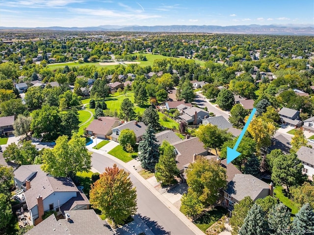 aerial view featuring a mountain view and a residential view