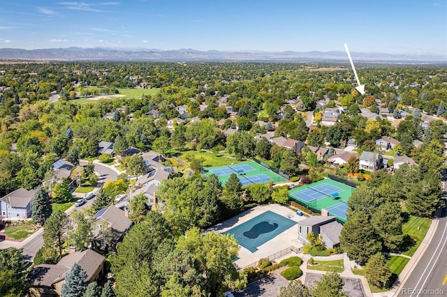 birds eye view of property with a mountain view