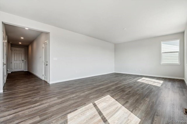 14378 Heritage Dr, Mead, CO 80504 - spare room with baseboards, recessed lighting, and dark wood-style floors
