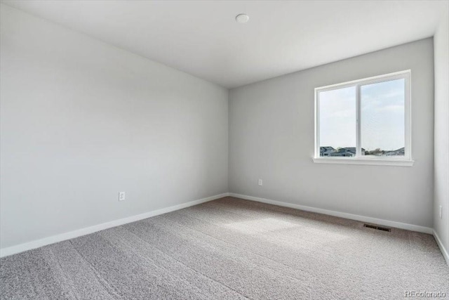 14378 Heritage Dr, Mead, CO 80504 - spare room featuring carpet floors, baseboards, and visible vents