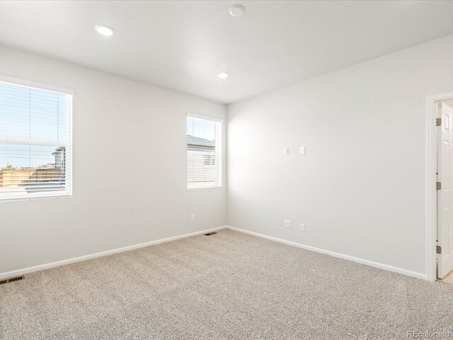 view of carpeted spare room