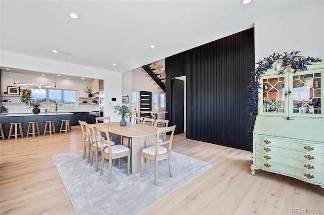 dining room with light hardwood / wood-style flooring