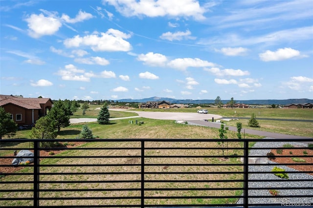 view of gate with a mountain view