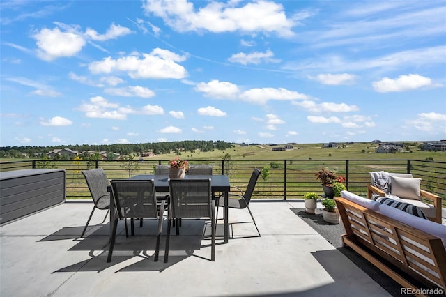 view of patio / terrace featuring a rural view