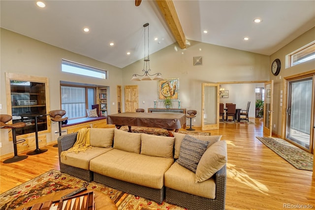 living room featuring pool table, beamed ceiling, high vaulted ceiling, and light wood-type flooring