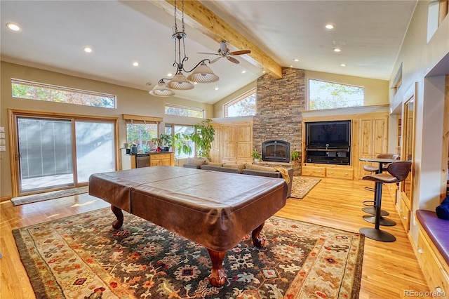 game room featuring beam ceiling, ceiling fan, light hardwood / wood-style flooring, and billiards