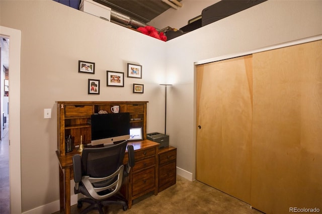 home office featuring carpet flooring