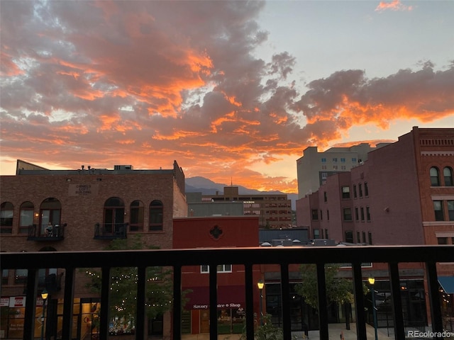 view of balcony at dusk