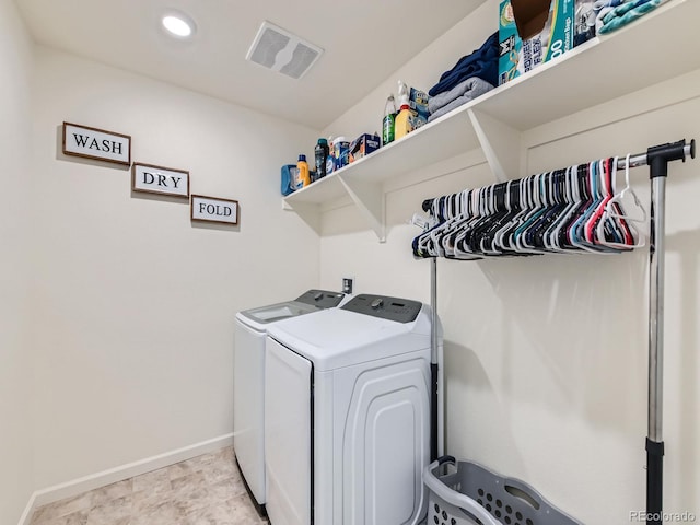 laundry area with washer and dryer