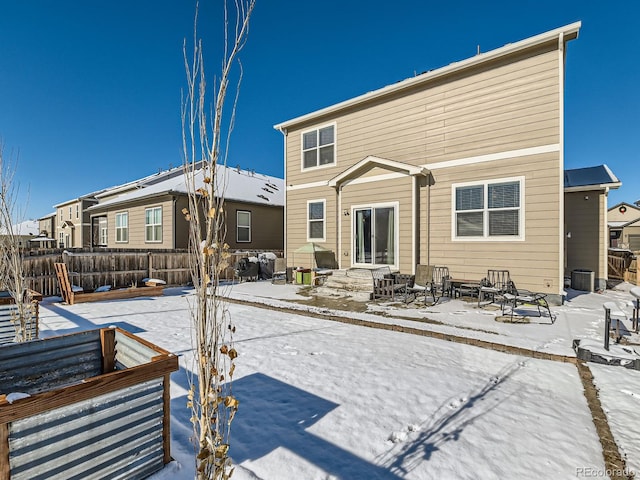 view of snow covered property