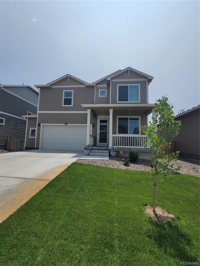 2300 Mountain Sky Dr, Fort Lupton, CO 80621 - craftsman-style home with an attached garage, a porch, driveway, and a front yard