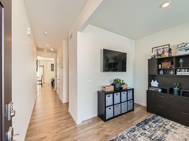 2300 Mountain Sky Dr, Fort Lupton, CO 80621 - interior space featuring light wood-style flooring, baseboards, and recessed lighting