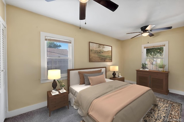 carpeted bedroom featuring ceiling fan