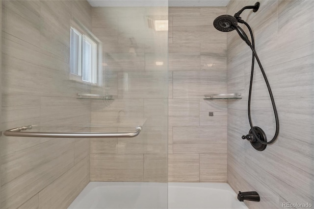 bathroom featuring tiled shower