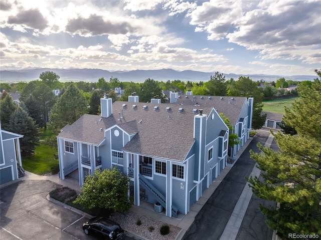 7452 Singing Hills Dr, Boulder, CO 80301 - aerial view of a mountain backdrop