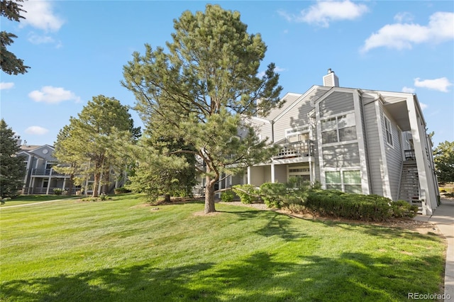 7452 Singing Hills Dr, Boulder, CO 80301 - view of green lawn featuring stairway