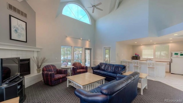 7452 Singing Hills Dr, Boulder, CO 80301 - living area featuring ceiling fan, high vaulted ceiling, and light carpet