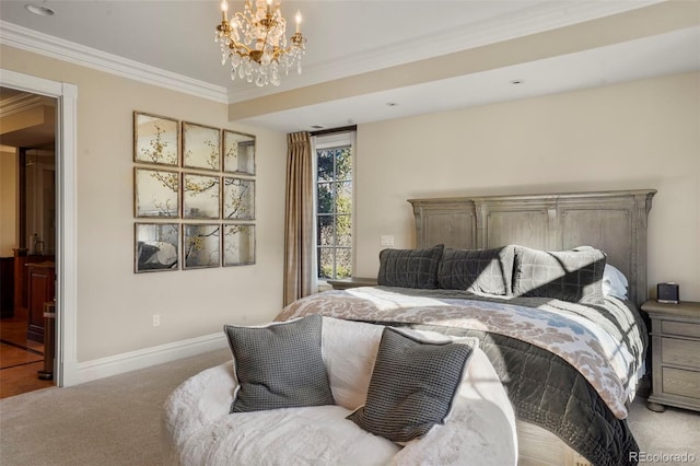 bedroom featuring a chandelier, ornamental molding, carpet flooring, and baseboards