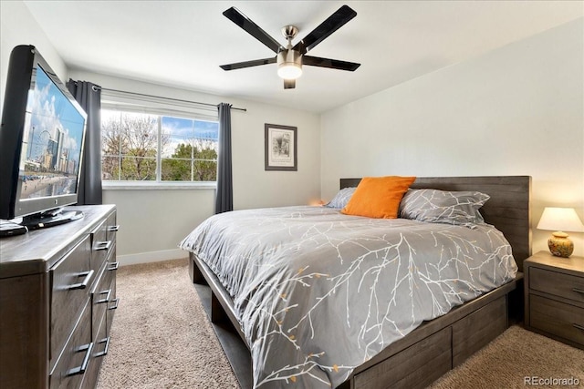 bedroom with carpet floors, baseboards, and ceiling fan