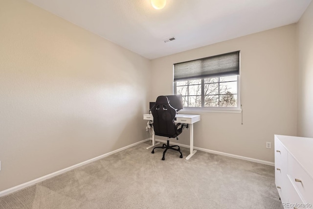 unfurnished office with light colored carpet