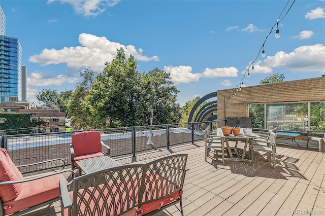 10 N Ogden St Unit 5, Denver, CO 80218 - wooden terrace featuring outdoor dining area